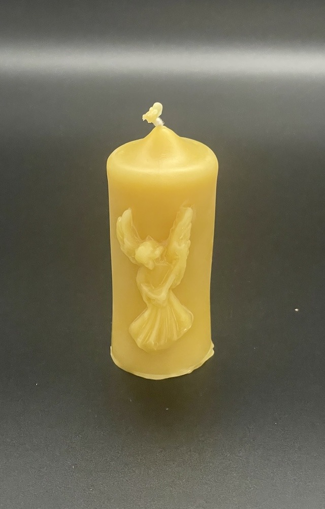 Stumpen mit Engelmotiv